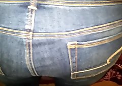 Cumshot on tight jeans ass