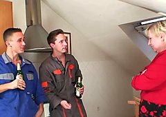 Old women pleases two repairmen