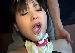 asian fellated by fake penises