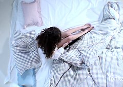 Luscious curly chick tries out her new sex toy